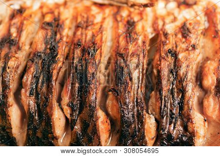 Cooking Fish On The Grill. Fried Fish. Fried Fish On The Fire. Close-up. Moment Of Cooking