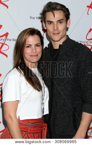 LOS ANGELES - JUN 23:  Melissa Claire Egan, Mark Grossman at the Young and The Restless Fan Club Luncheon at the Marriott Burbank Convention Center on June 23, 2019 in Burbank, CA