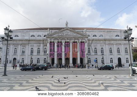 Lisbon, Portugal. April 2018.a View Of The Facade Of Teatro Nacional D. Maria Ii In Rossio Square,