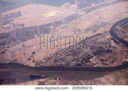 Aerial view of the Iran, Iraq border along the Shatt al-Arab river with Abadan International Airport at center.