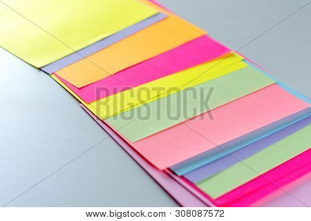 Blue, Pink, Yellow, Purple, Green, Orange Neon Paper Color For Background. Striped Geometric Pattern