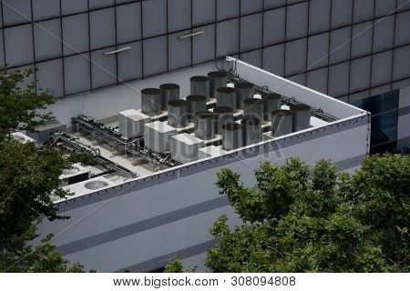Commercial Cooling Hvac Air Conditioner Condenser On Large Commercial Building Rooftop For Climate C