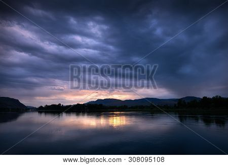 Kamloops Clouds Thompson River. Dramatic Clouds At Sunset Over The Thompson River In Kamloops.