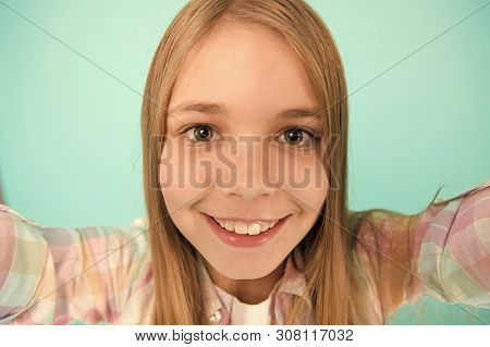 Let Me Take Selfie. Child Girl Hold Smartphone Takes Photo. Child Kid Happy Face. Video Call Concept