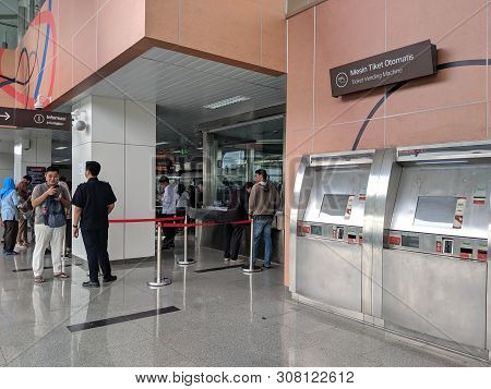 Jakarta, Indonesia - June 17, 2019: People Line Up To Buy Lrt Train Ticket On Ticket Counter At Velo