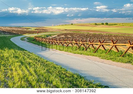 Newly constructed regional trail - Longview Trail connecting Loveland and Fort Collins along northern Colorado foothills, early summer scenery