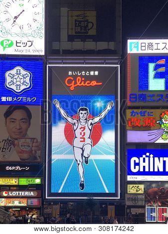Osaka, Japan - May 25, 2019 : Famous Glico Man Billboard At Osaka City Night.