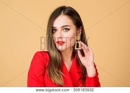Impeccable Makeup And Perfect Jewelry. Red Suits Her. Pretty Woman Make Up Face Red Sensual Lips. Re