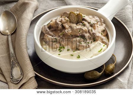 Beef Stroganoff With Mashed Potatoes. The Traditional Dish Of Russian Cuisine. Beef Meat In A Thick 
