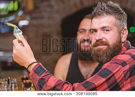 Hipster Brutal Bearded Man Spend Leisure With Friend At Bar Counter. Order Drinks At Bar Counter. Me