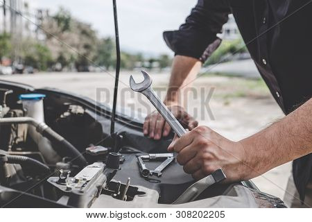 Services Car Engine Machine Concept, Automobile Mechanic Repairman Hands Repairing A Car Engine Auto