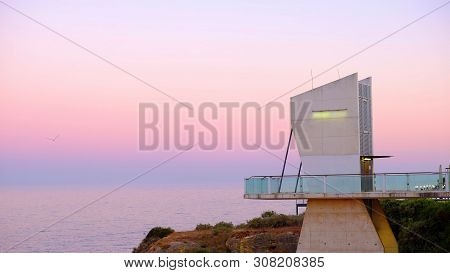 View On On The Lookout And The Elevator In Albufeira On The Sunset. Region Faro, Algarve. Portugal.