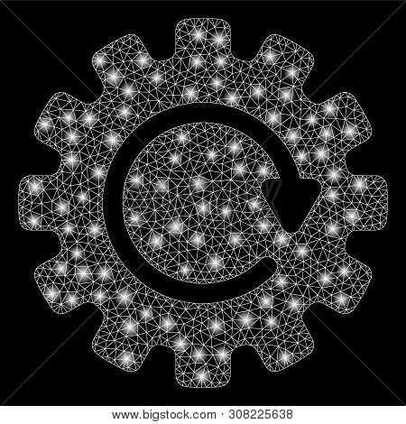 Glossy Mesh Gearwheel Rotation With Glitter Effect. Abstract Illuminated Model Of Gearwheel Rotation