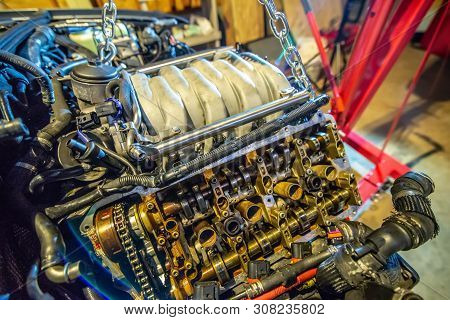 V8 Engine Out On Hoist To Get Rebuilt