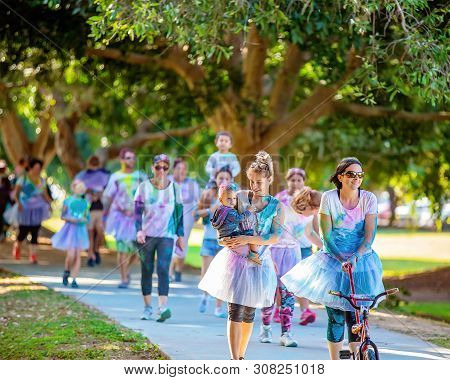 Mackay, Queensland, Australia - June 2019: Unidentified Women And Children Enjoying Color Frenzy Fun