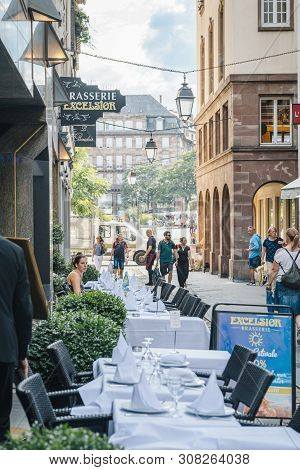Strasbourg, France - July 22, 2017: Rue De Loutre Street With Luxury Brasserie Excelsior White Table