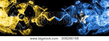 Somalia, Somalian Vs Nuclear Smoky Mystic Flags Placed Side By Side. Thick Colored Silky Smokes Comb