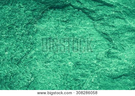 Vintage Green Background. Rough Painted Wall Of Emerald Color. Imperfect Plane Of Virid Colored. Une