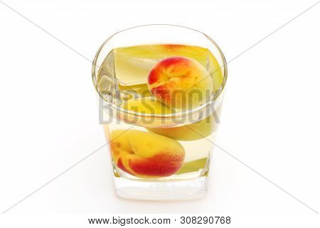 Japanese Plum Wine Called Umeshu On White Background