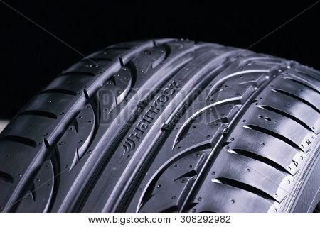 Krasnoyarsk, Russia, 2 June 2019: New Summer Tire Hankook Close-up, Black Background