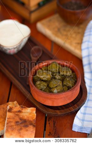 Yarpag Dolmasi, Yaprak Sarmasi, Green Grape Leaves Stuffed With Rice And Meat In Pottery Bowl. Image