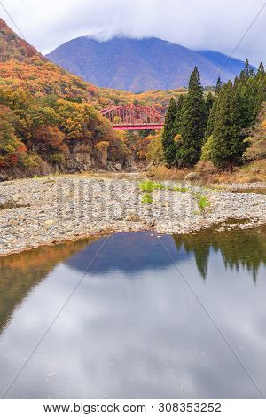 Red Bridge Cross River Among The Autumn Forest In To-no-hetsuri - Shimogo, Fukushima, Japan