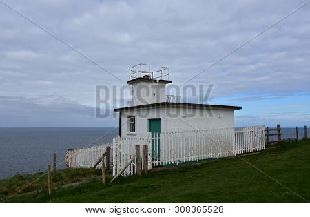 Attractive White Coastguard Station On St Bees Head In England.
