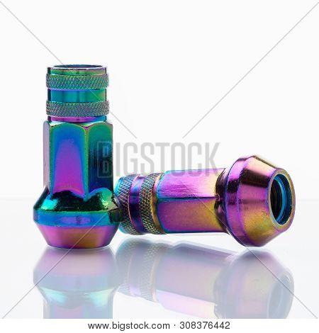 Wheel Nuts On A White Gradient Background, Multicolored, Chameleon, Close-up.