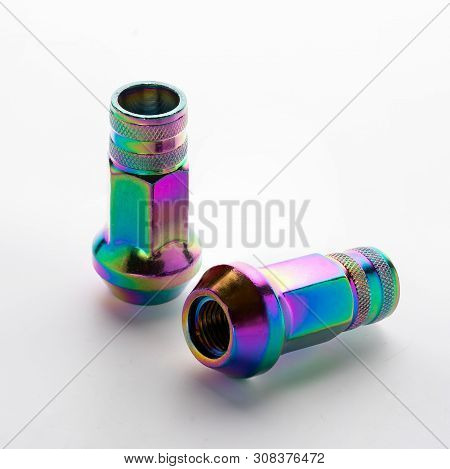 Wheel Nuts On A White Gradient Background, Multicolored, Chameleon, Close-up.