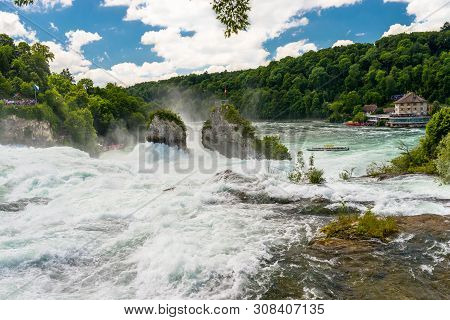Neuhausen Am Rheinfall, Switzerland - 23 July 2019. Waterfall On The River Rhine In The City Neuhaus