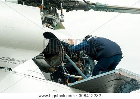 Tyumen, Russia - June 19, 2019: Aircraft Repair Helicopter Utair Engineering Plant. Male Mechanic In
