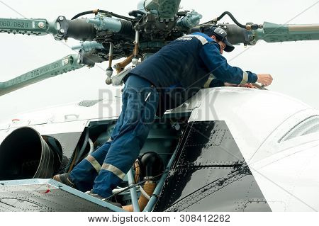 Tyumen, Russia - June 19, 2019: Aircraft Repair Helicopter Utair Engineering Plant. Male Mechanic In