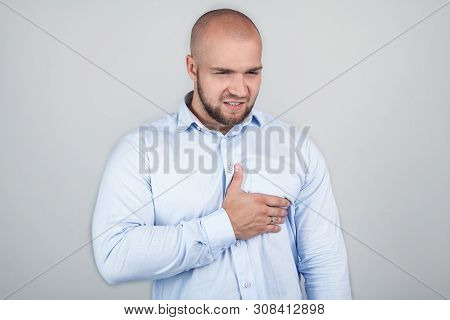 Handsome Young Man Keeps Hand, Being Stricked By Awful News, Expresses Negative Feeling, Has Strong 