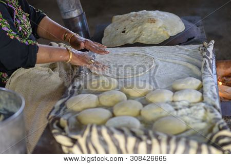 Close Up Of Old Arab Woman Hands Kneading Fresh Dough For Taboon Bread Or Lafah Is A Middle Eastern 