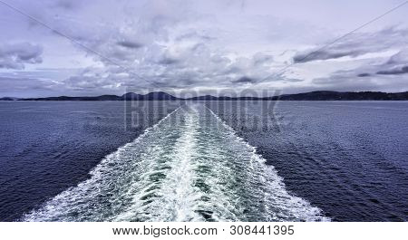 Water Wake Behind Speed Boat In Canada Will Make For Great Background Graphic.