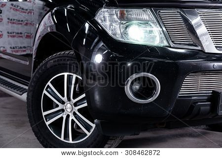 Novosibirsk, Russia - June 22, 2019:  Nissan Pathfinder, Close-up Of The Headlight, Bumper, Wheel. P