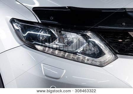 Novosibirsk, Russia - June 22, 2019:  Nissan X-trail,  Close-up Of The Headlight, Bumper. Photograph