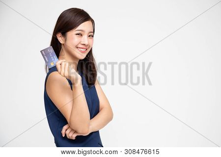 Happy Asian Woman Holding Credit Card Or Cash Advances, Pay Instead Of Money And Specially Curated B