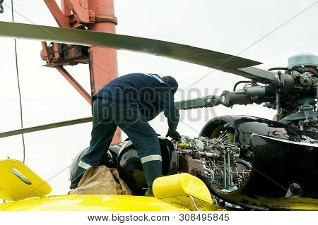 Tyumen, Russia - June 19, 2019: Aircraft Repair Helicopter Utair Engineering Plant. Male Mechanic In
