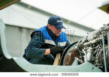 Tyumen, Russia - June 19, 2019: Aircraft Repair Helicopter Utair Engineering Plant. Male Mechanic In