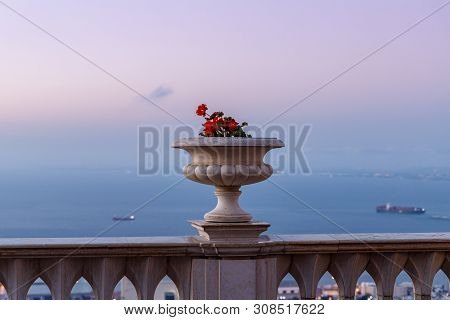 Haifa, Israel, June 26, 2019 : Sunset View Of The Decorative Pot With Geraniums On The Balcony Raili