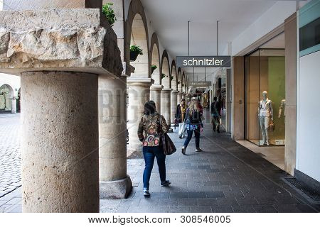 Munster, Germany - May 9: People On Street On May 9, 2013 In Munster, Germany. Largely Destroyed Dur