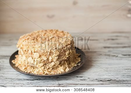 Slice Confectionery Napoleon Cake. Portion Of Custard Cream Dessert Copy Space. Crumbs Around Plate.