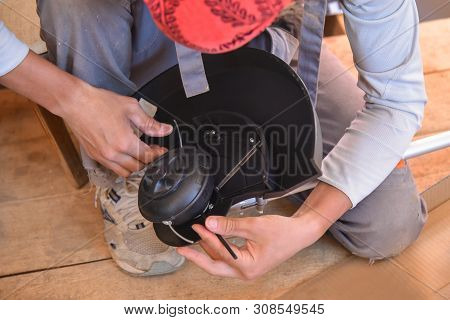 Trimmer Close Up Mow The Grass With A Lawnmower. Gardening With A Brush Cutter Close-up. Lawn Care W