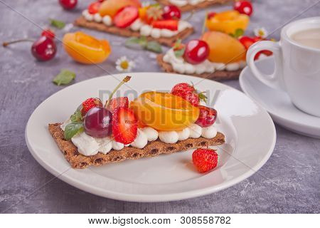 Crisp Bread With Creme Cheese, Fruit And Berries