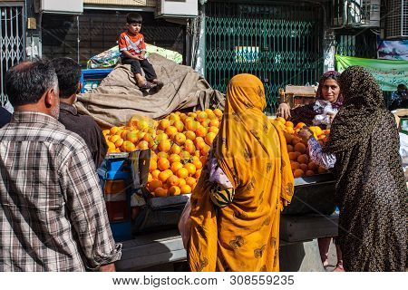 Bandar Abbas, Iran - February 28: Local Women At Fruit Market In Bandar Abbas, Iran On February 28, 
