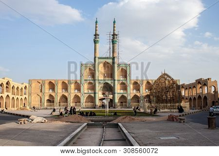 Yazd, Iran - March 2: People Rest In Front Of Amir Chakhmaq Complex In Yazd On March 2, 2013. This B