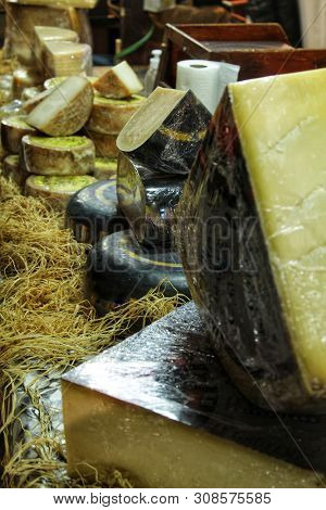 Sale Of Different Kind Of Cheesses At A Market Stall In Santa Pola, Spain
