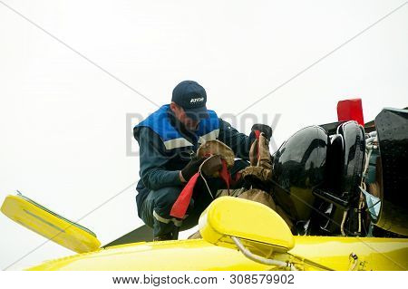 Tyumen, Russia - June 19, 2019: Aircraft Repair Helicopter Utair Engineering Plant. Male Mechanic In