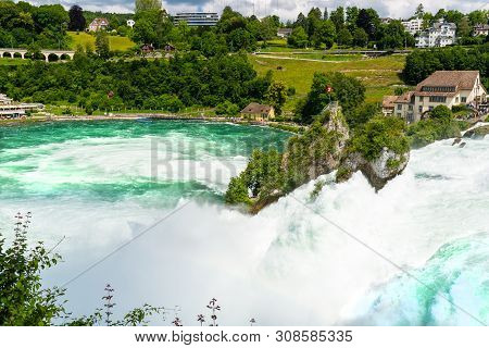 Neuhausen Am Rheinfall, Switzerland - 23 July 2019. Waterfall On The River Rhine In The City Neuhaus